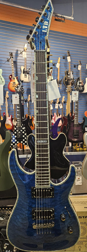 Guitare électrique ESP LTD Deluxe MH-1000 d'occasion avec étui rigide